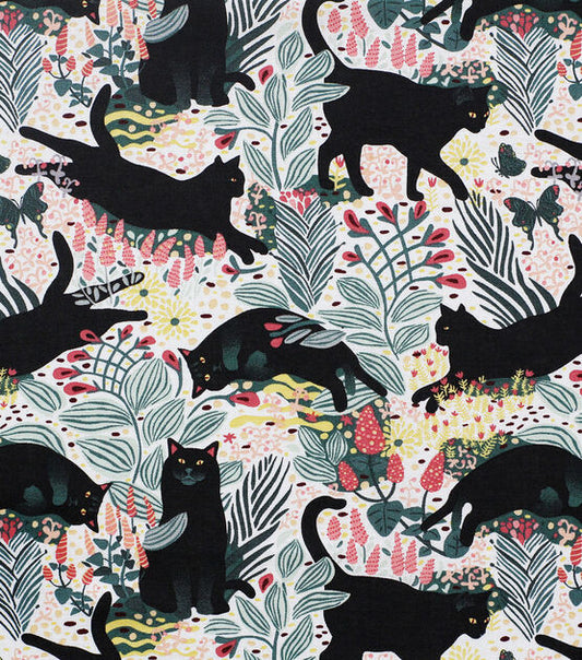 Black Cats Playing on Flower Garden Cotton fabric